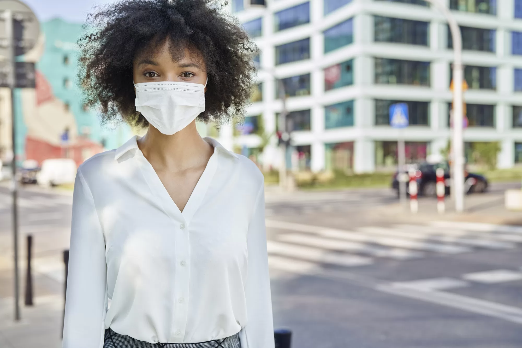 Portrait of African woman in face mask on the street: Understanding the Social Relief of Distress Grant: What You Need to Know