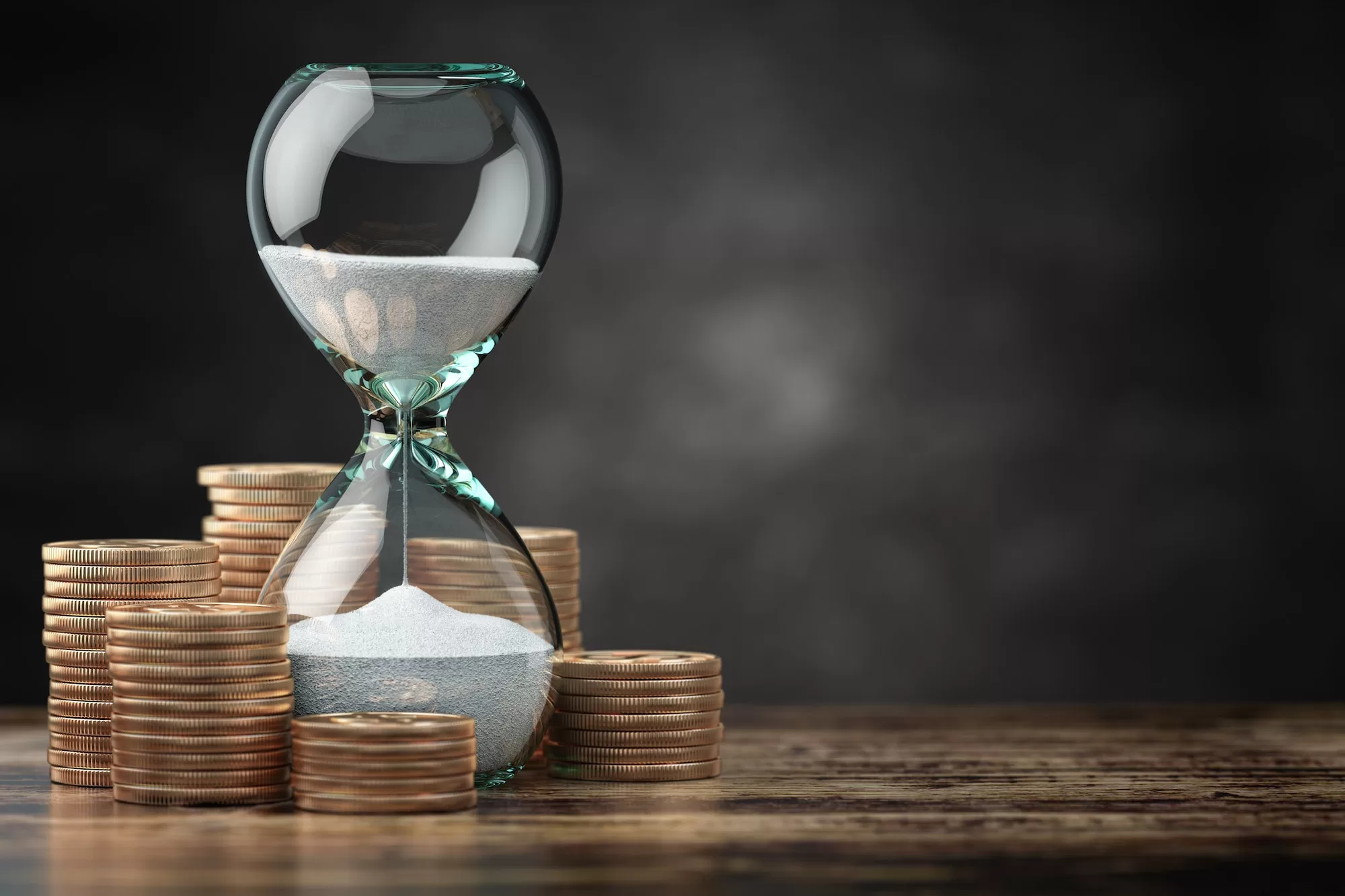 Golden coins and hourglass clock. Return on investment, deposit, growth of income and savings | Understanding Capital Gains Tax: A Beginner’s Guide