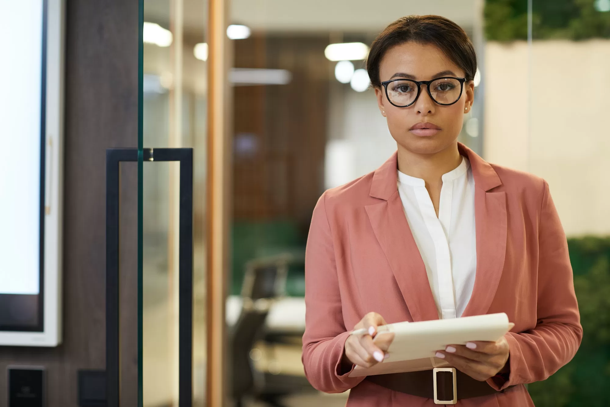 African businesswoman with documents | A Guide to Close Corporation Forms in Namibia