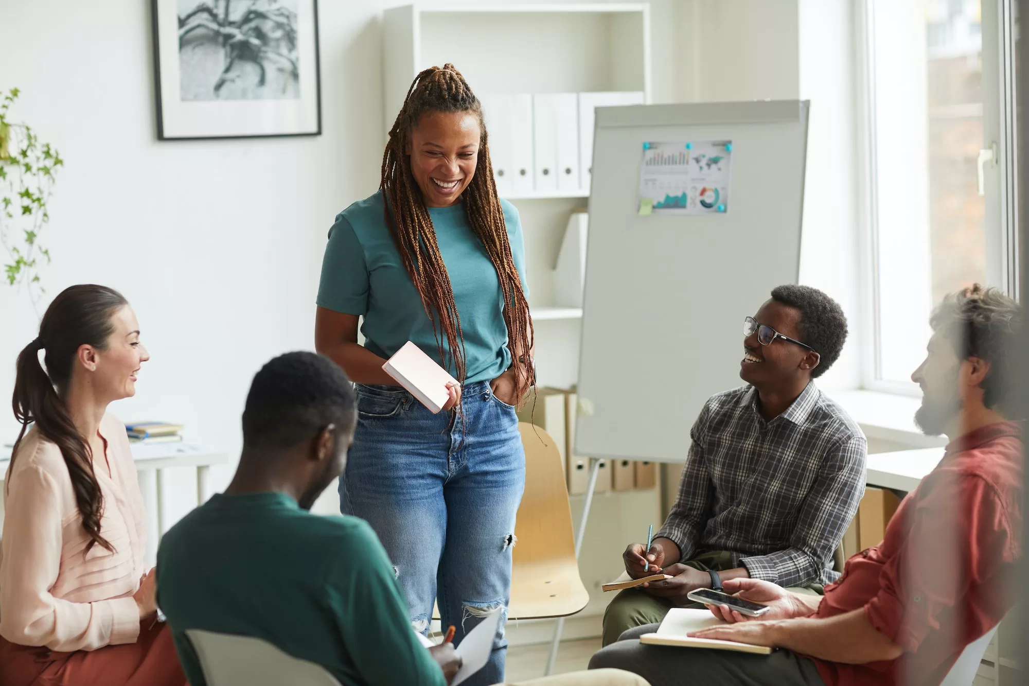 African Woman Leading Business Meeting Telling People How To Obtain a Certificate of Good Standing in Namibia: What You Need to Know