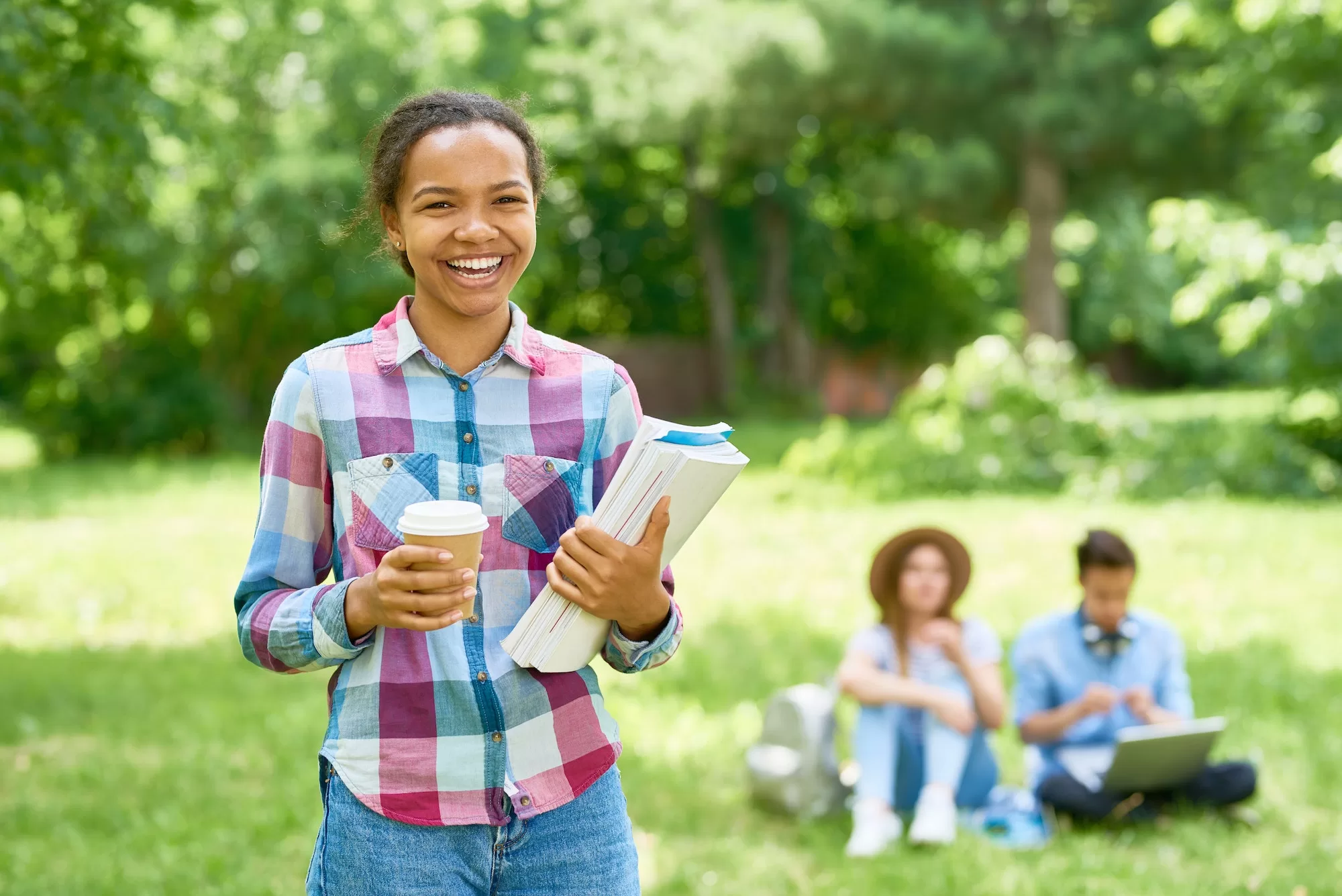 Cheerful African Student on Campus Lawn | Invest in Your Future with Namport Bursary Scheme