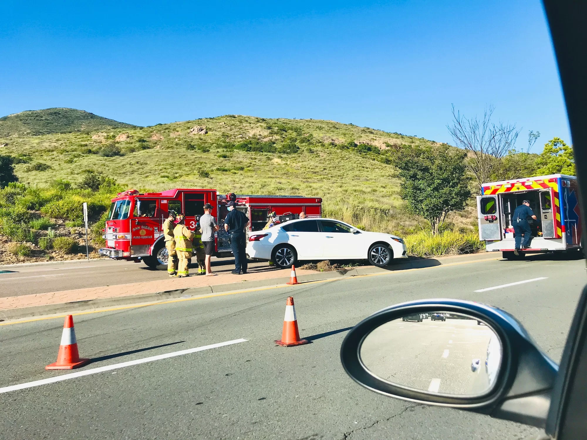 Traffic jam as first responders help a motorist who was injured in a car accident | More details About MVA Fund Claims