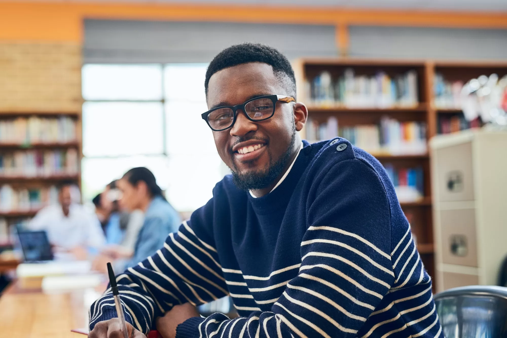 Is conditional admission considered for the Bachelor of Education in Secondary Education degree programs? Im working hard for those grades. Portrait of a university student sitting in the library.