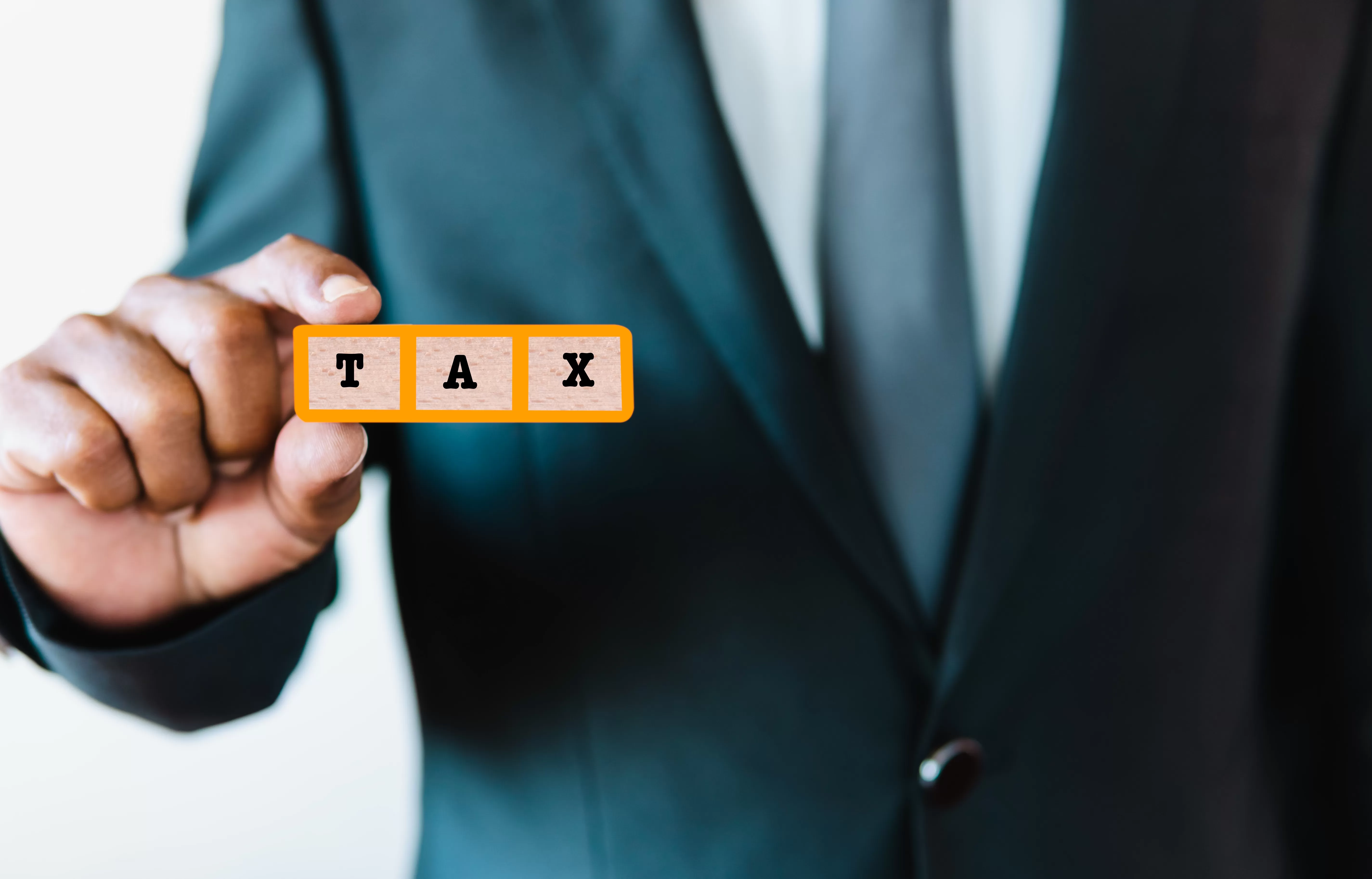 Your SARS Tax Payment Triumph Awaits. Business man holding tax text sign for present promote payment