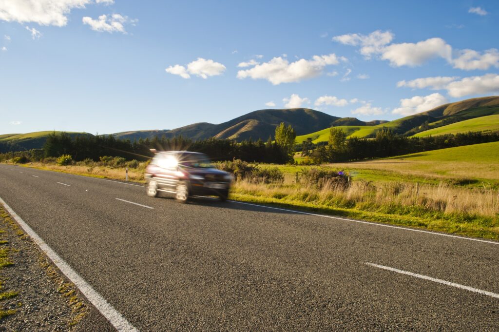 Car Speeding Along a Road | How to control your Speed for Optimal Performance